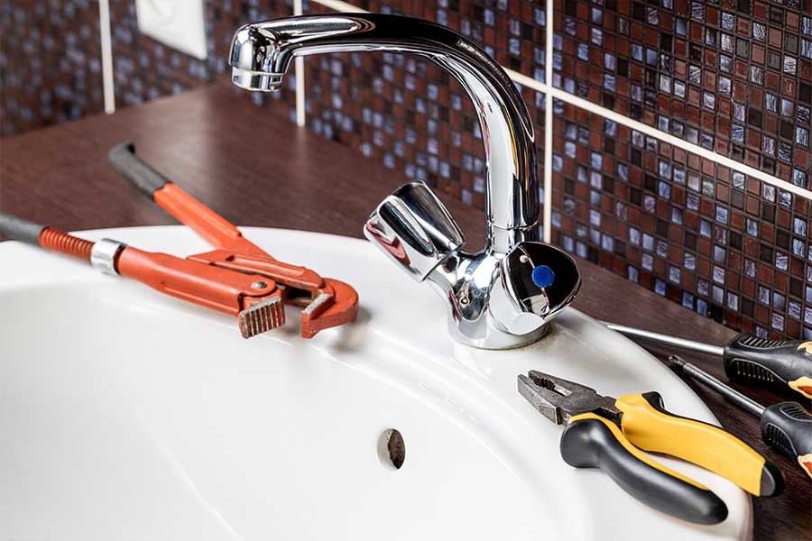 Sink faucet repair with plumbing tools